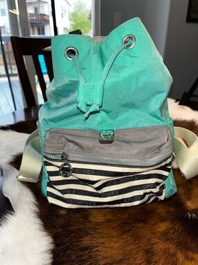 CROCS Turquoise Drawstring Backpack with Striped Front Pocket